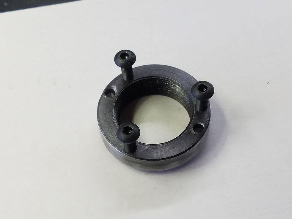 Ring with holes drilled an tapped